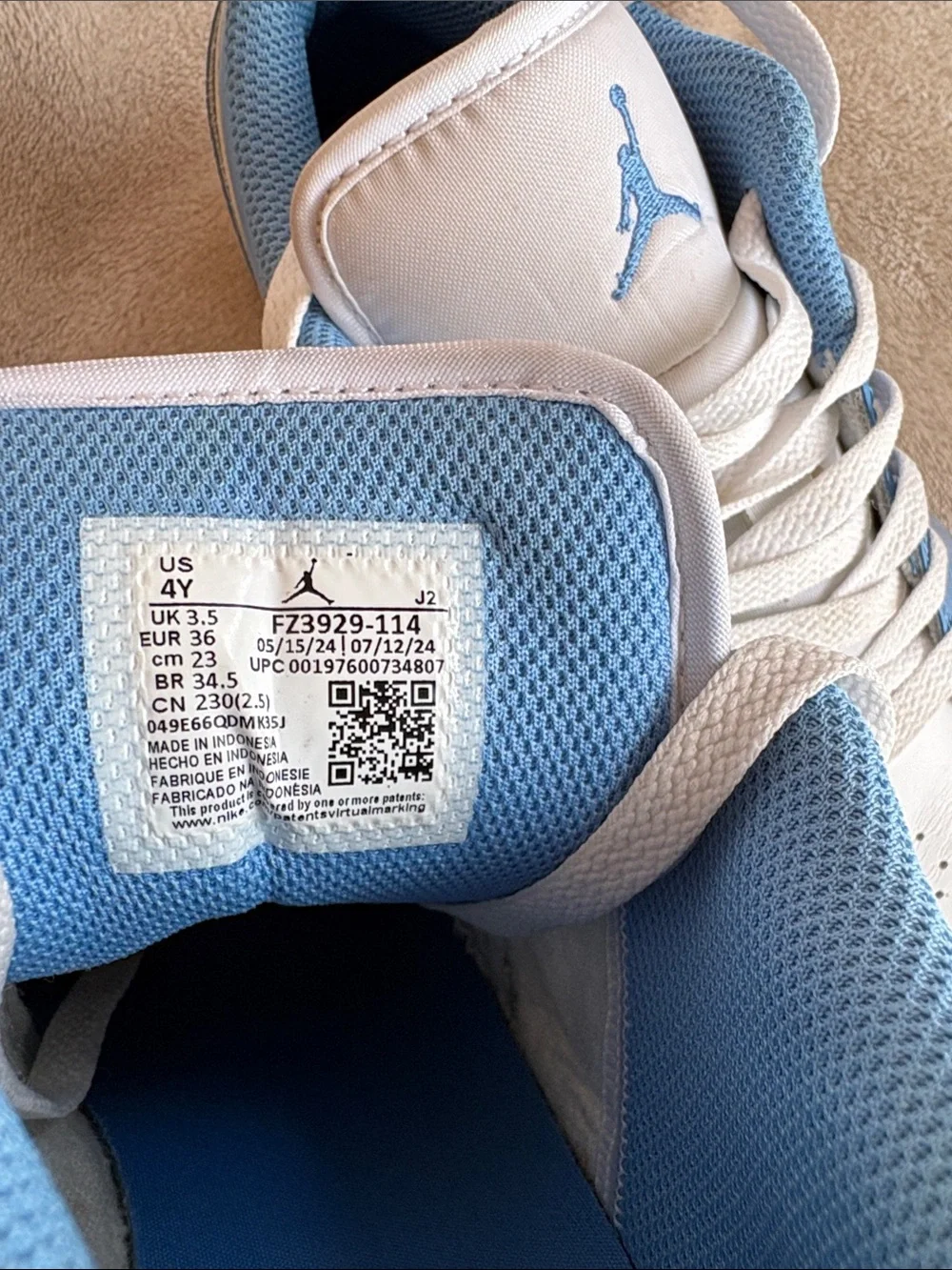 Nike Air Jordan 1 Low Boys Sneakers in University Blue and White